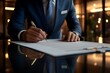 © Ekkarat_Studio - Businessman signing contract document with pen on desk in office