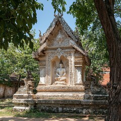 Sticker - Ancient Buddha Shrine in a Lush Temple Garden