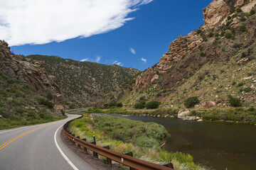 Road beside the Arkansas River flowing through Royal Gorge Canyon, Colorado