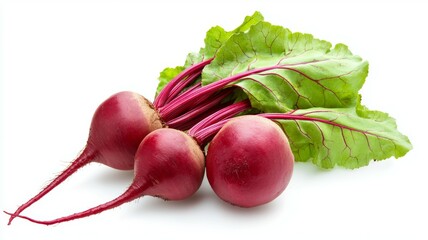 Three red beets with green leaves on top