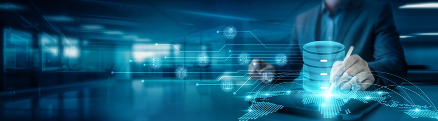 Businessman drawing global structure networking database management graph and on office table with tab, utilizing software for data organization and analysis to improve efficiency and decision-making.