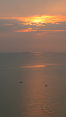 Wall Mural - beautiful view of golden sea and sky in the evening, natural background