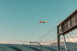 © Austockphoto - Airplane coming into land over Sydney Airport Domestic Terminal