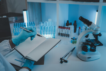 Wall Mural - working atmosphere in the laboratory, chemistry and science specialist working in a lab with various