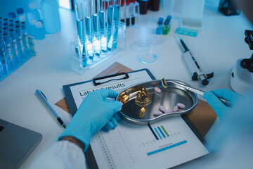Wall Mural - a scientist is testing various pills in order to improve their quality an effectiveness in the labor