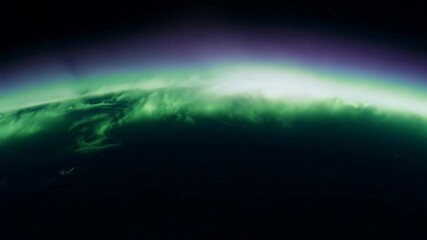Wall Mural - a stunning view of earth from space highlights the vibrant greens and purples of the aurora borealis