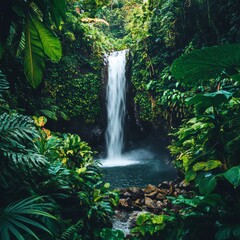 Sticker - A cascading waterfall flows through lush green foliage in a tropical rainforest.