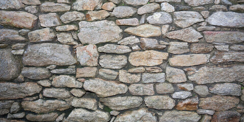 Wall Mural - facade rustic background old stone wall line several shades of gray