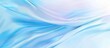 © StockKing - Smooth blue curve design blending with blurred lines creates a light blue gradient abstract banner background with ample copy space image