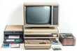 © Boinah - A vintage computer setup with a monitor, keyboard, and storage devices from the past.