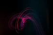 © Westend61 - Light trails with swirling pattern on black background
