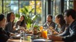 © bird_saranyoo - Employees sharing insights during a lunch meeting, fostering a relaxed environment for collaboration and idea exchange.
