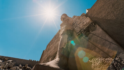 antique statue in the pillared hall in Luxor in Egypt