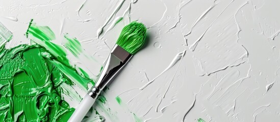 Aufkleber - Green plasticine brush on white backdrop with copy space image