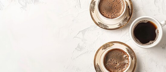 Aufkleber - Top view of Turkish coffee cups and cezve on a white background with copy space image