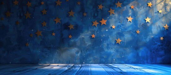 Aufkleber - Stars decorate a blue wall with copy space image