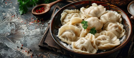 Aufkleber - Preparing traditional Ural dumplings filled with minced pork and served on a plate with a tantalizing copy space image