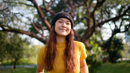 go green culture gen z asia people young adult woman curly hair enjoy cheerful relax toothy smile ha