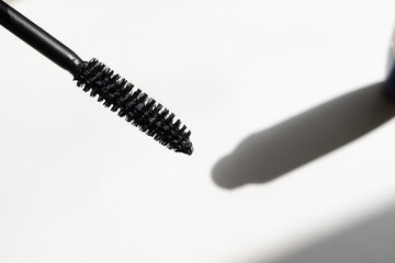 black mascara on white background close-up