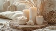 © Gentle Bunny - A serene arrangement with white candles, pampas grass, and textured elements in soft neutral tones, creating a warm and cozy atmosphere.