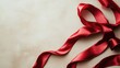 © -Quantum Pixels- - Satin ribbon in a vibrant red hue against a soft neutral backdrop