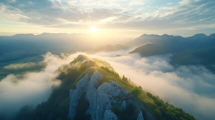 Wall Mural - Aerial view of mountains in low clouds at sunrise in summer Slovenia View from above of mountain peak in fog Beautiful landscape with rocks forest sunlight colorful sky Top view of fog : Generative AI