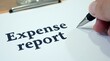 © vitanovski - Close-up of expense report with pen on paper document