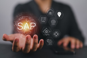 Poster - SAP or ERP enterprise resources planning system concept - Person hold virtual globe with SAP word for business process automation software and management software (SAP)