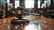 © 69 - A shattered gavel lying on a judge's bench, with a blurred courtroom background. The image conveys the gravity of broken justice or tough arbitration.