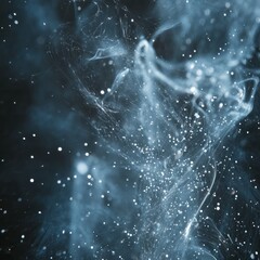 Canvas Print - Abstract blue and white smoke-like pattern with white glitter floating on a black background.