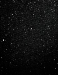 Wall Mural - nocturnal snowfall: textured white grain and dust against black