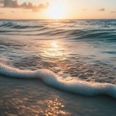 Sticker - Close-up of foamy ocean wave lapping on sandy beach at sunset.