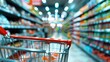 © PanArt - Shopping cart view in Supermarket aisle with product shelves abstract blur defocused background