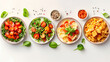 © Akharadat - set of plates of food isolated on a white background, top view