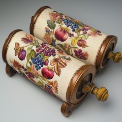 Wall Mural - Two vintage wooden spools with floral embroidery.