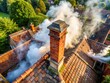 © Sirinporn - chimney from above with intricate brickwork and swirling smoke clouds