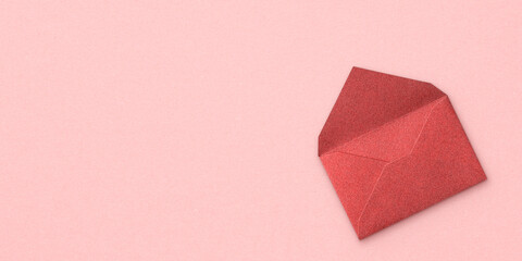 Wall Mural - open red envelope and copy space on pink background