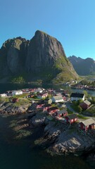 Wall Mural - enjoy breathtaking aerial views of reine, norways lofoten islands, with its charming fishing village