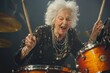 © Premium Photo - Elderly woman playing drums in a rock band, passionately immersed in the music. Her face glowing with enthusiasm and rhythm. Professional portrait highlighting her dynamic energy.