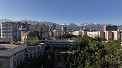 Wall Mural - View from a quadcopter of the central part of the Kazakh city of Almaty on  autunm morning