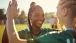 © LukaszDesign - Smiling young athlete enjoying sports with teammates during practice or a match, expressing excitement and happiness for the game or training session