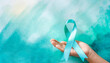 © Claudio Bórquez - cyan ribbon sexual assault prevention