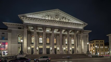 Wall Mural - Munich National Theatre or Nationaltheater on the Max Joseph square night timelapse hyperlapse. Illuminated historic opera house front view, home of the Bavarian State Opera. Germany