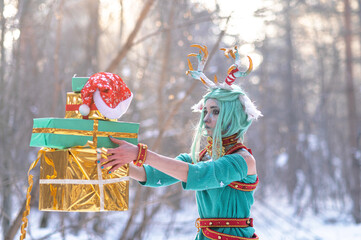 Christmas deer girl looking for gifts for Santa in winter in the forest