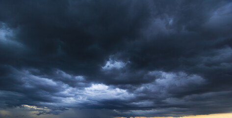 Aufkleber - Bad or moody weather sky and environment. climate change. carbon dioxide emissions, greenhouse effect, global warming.The dark sky with heavy clouds converging and a violent storm before the rain.