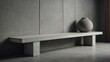 © Kasper - Minimalist concrete shelf with a white top against a modern backdrop.