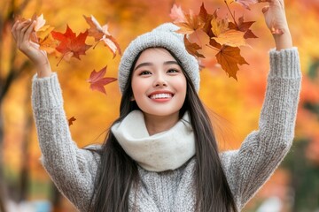 An autumn-loving young woman strolls through a forest during the autumn season