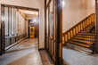 © Nibuya Qubik/Stocksy - An opulent lobby and staircase in an historic building