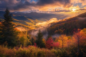 There is fog and haze in the distant valleys of the Great Smoky Mountains National Park along with peak autumn colors.