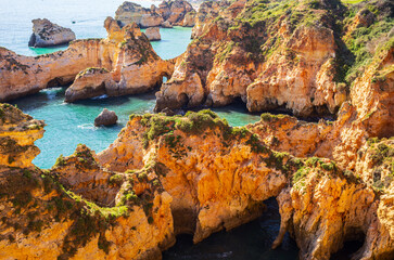 Wall Mural - Over the cliffs of Praia do Ferta beach near Alvor, in Portugal